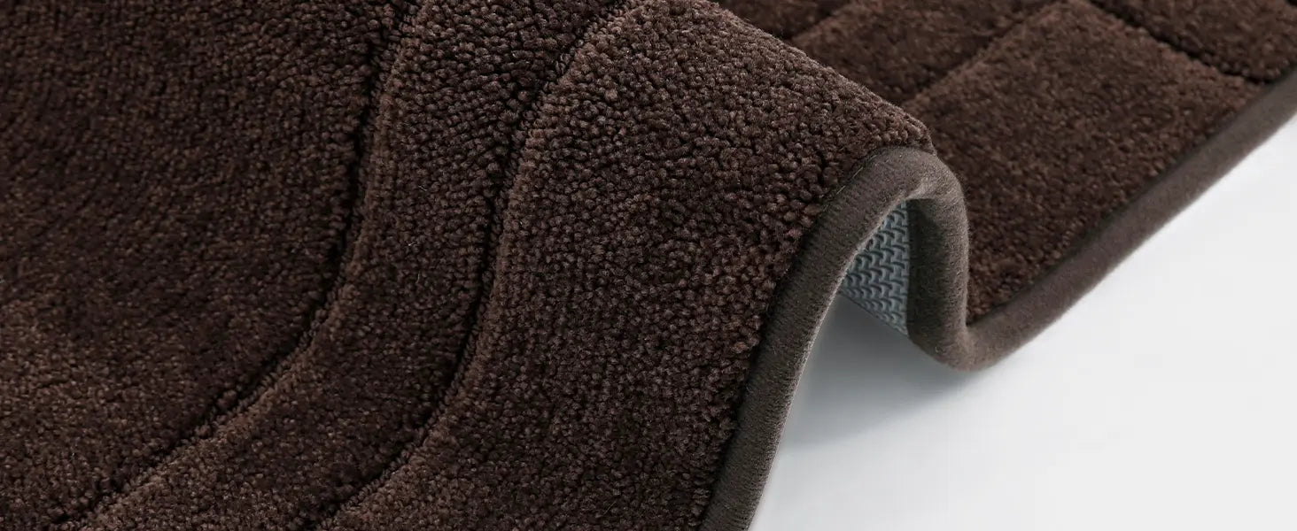 Brown kitchen mat with textured surface on a white background